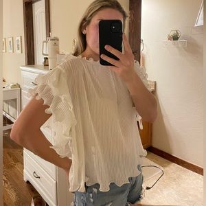 White blouse with shoulder detailing